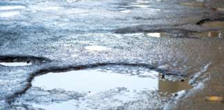 Sporadic Showers Impact Plans for Roadwork on College Street